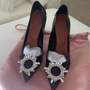 Amina Muaddi black vinyl heels